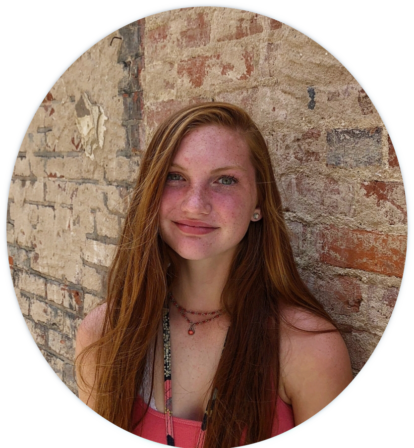 picture of Josie in front of brick wall